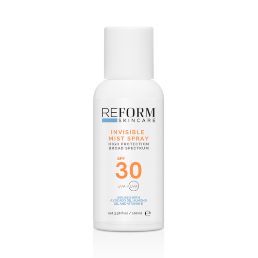 Reform Skincare SPF 30 Invisible Mist Spray bottle with a fine mist being sprayed, offering lightweight, non-greasy sun protection and hydration